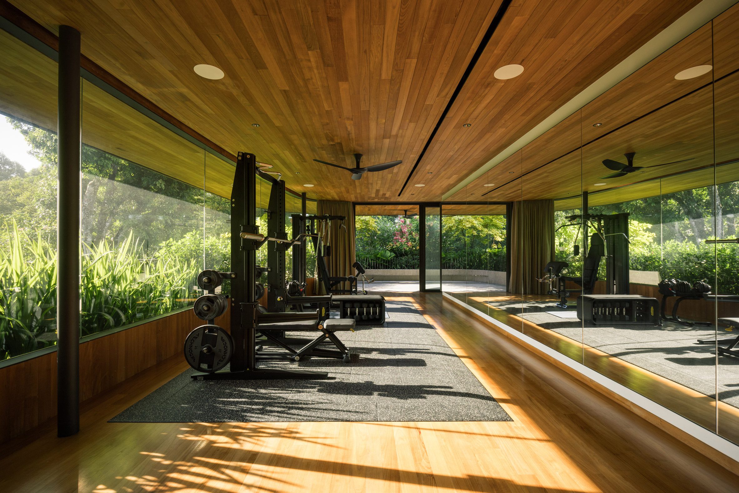 View of gym at home by Wallflower Architecture + Design
