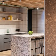 Kitchen with terrazzo counter of Addison Studios by Tigg + Coll Architects