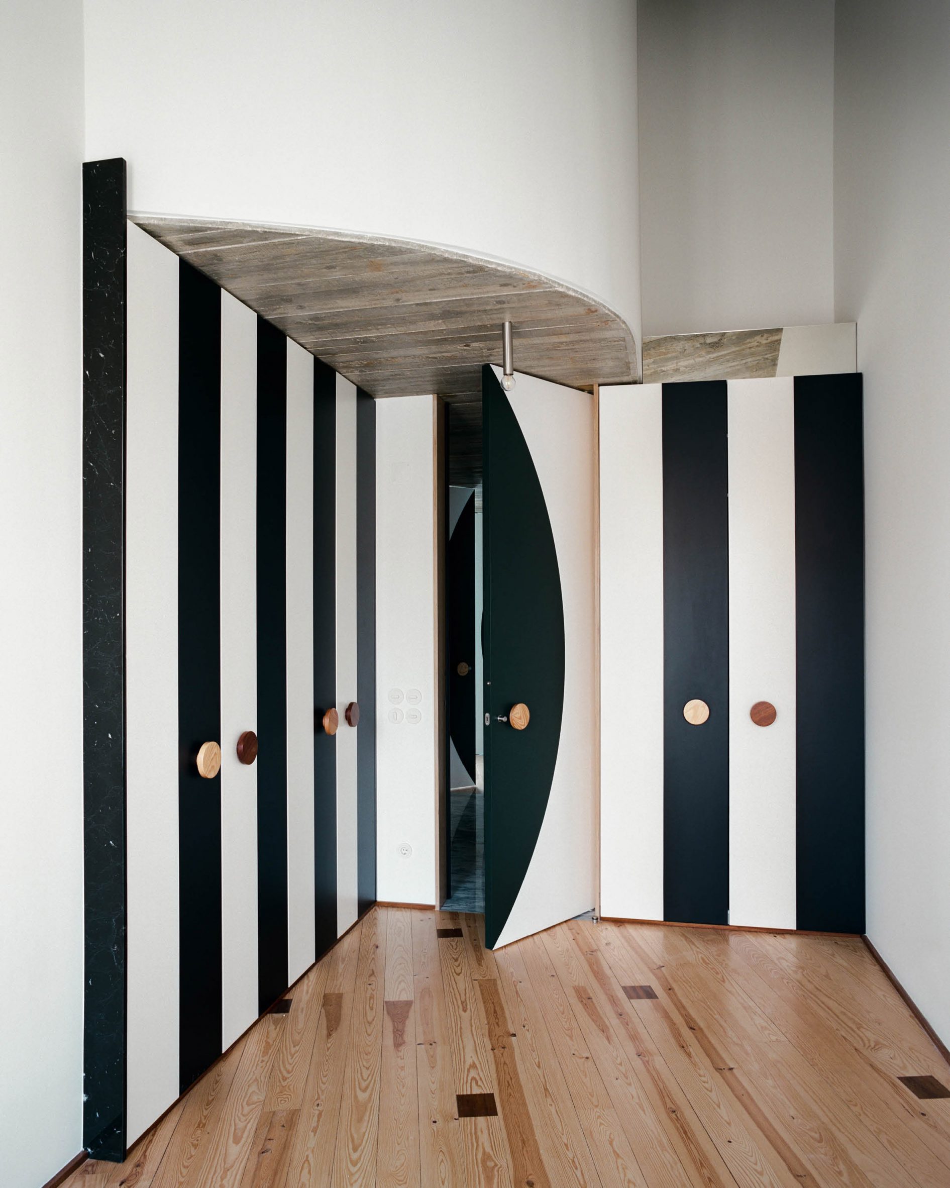 Custom striped cabinetry by Fala Atelier