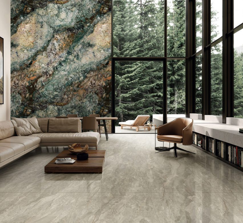 Living room with dramatic stone and marble floors and walls