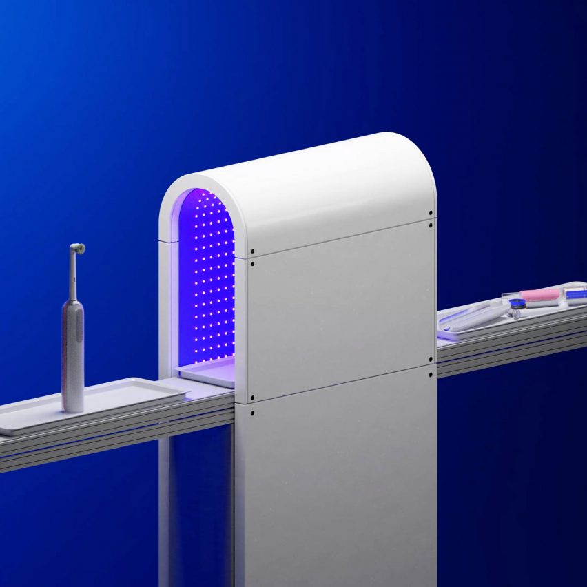 3D graphic s،wing a conveyer belt of electric toothbrushes going into a purple-lit tunnel and emerging on the other side in pieces