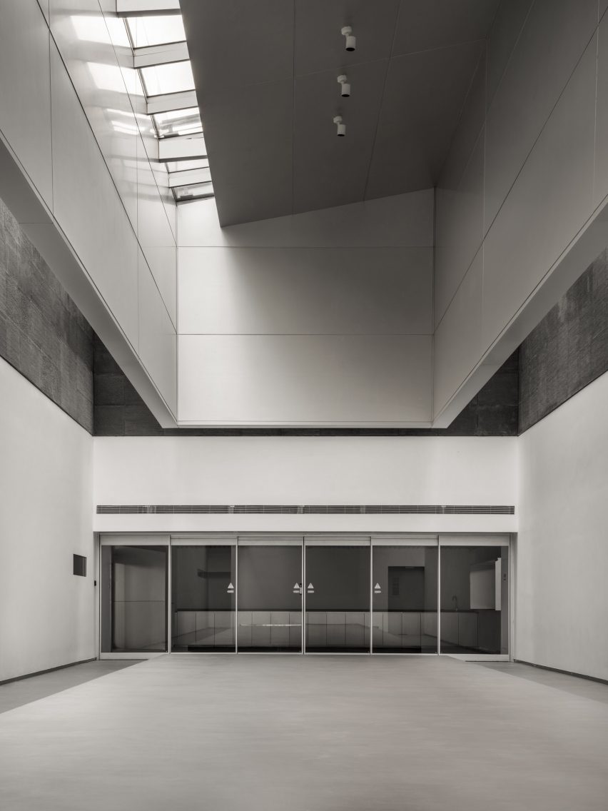Exhibition hall interiors in MAHA Art Centre by Buzz in Beijing