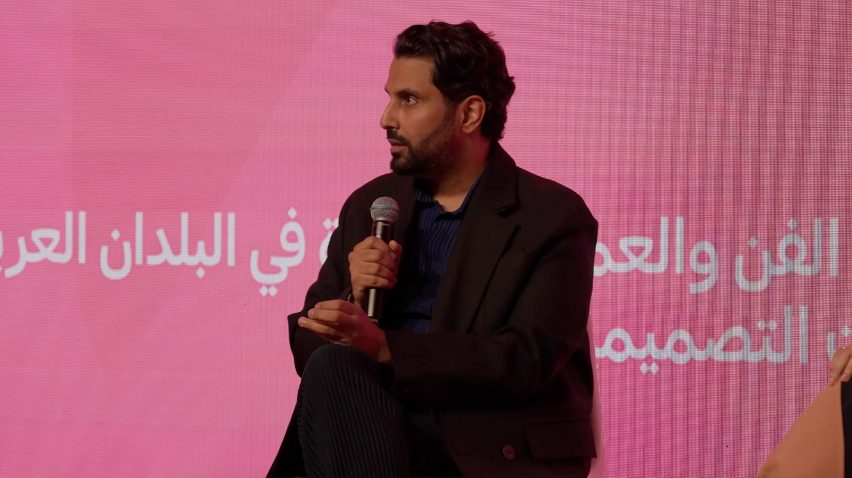 Jassim Alsaddah speaks on stage at the Design Doha Forum