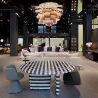 A showroom with a striped table