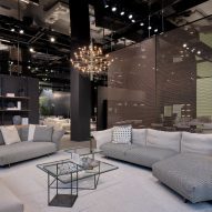 A showroom with gray furniture