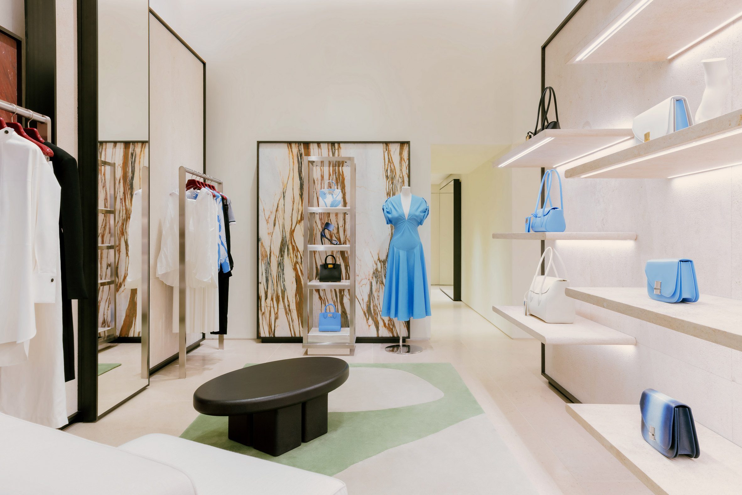 Clothes and accessories on display inside Milanese fashion boutique by Vincent Van Duysen