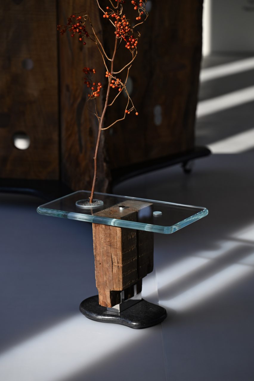 Gl، and wood table in a collectible exhibition in Dubai