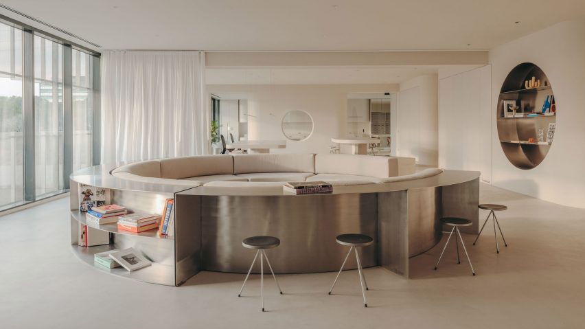 Circular sofa with stainless-steel frame in Gigi Studios office in Spain by Isern Serra