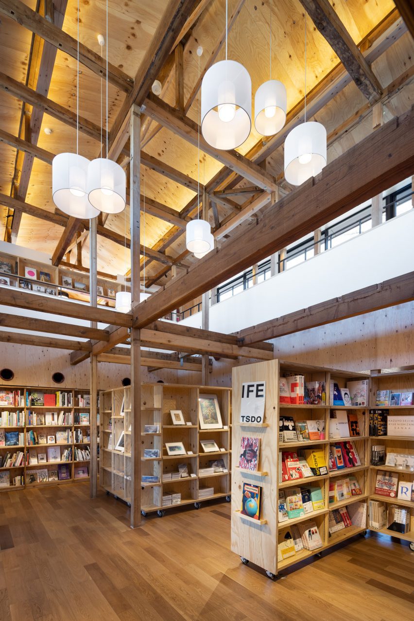 View of double-height bookstore within bookshop by Klein Dytham Architecture