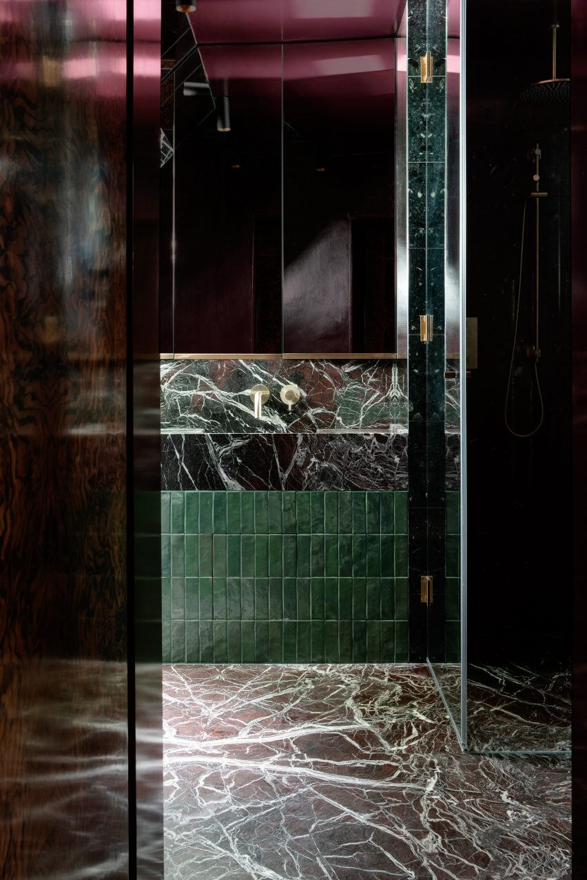 En-suite marble-clad bathroom
