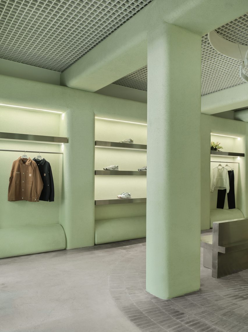 Golf clothing boutique with green stucco walls