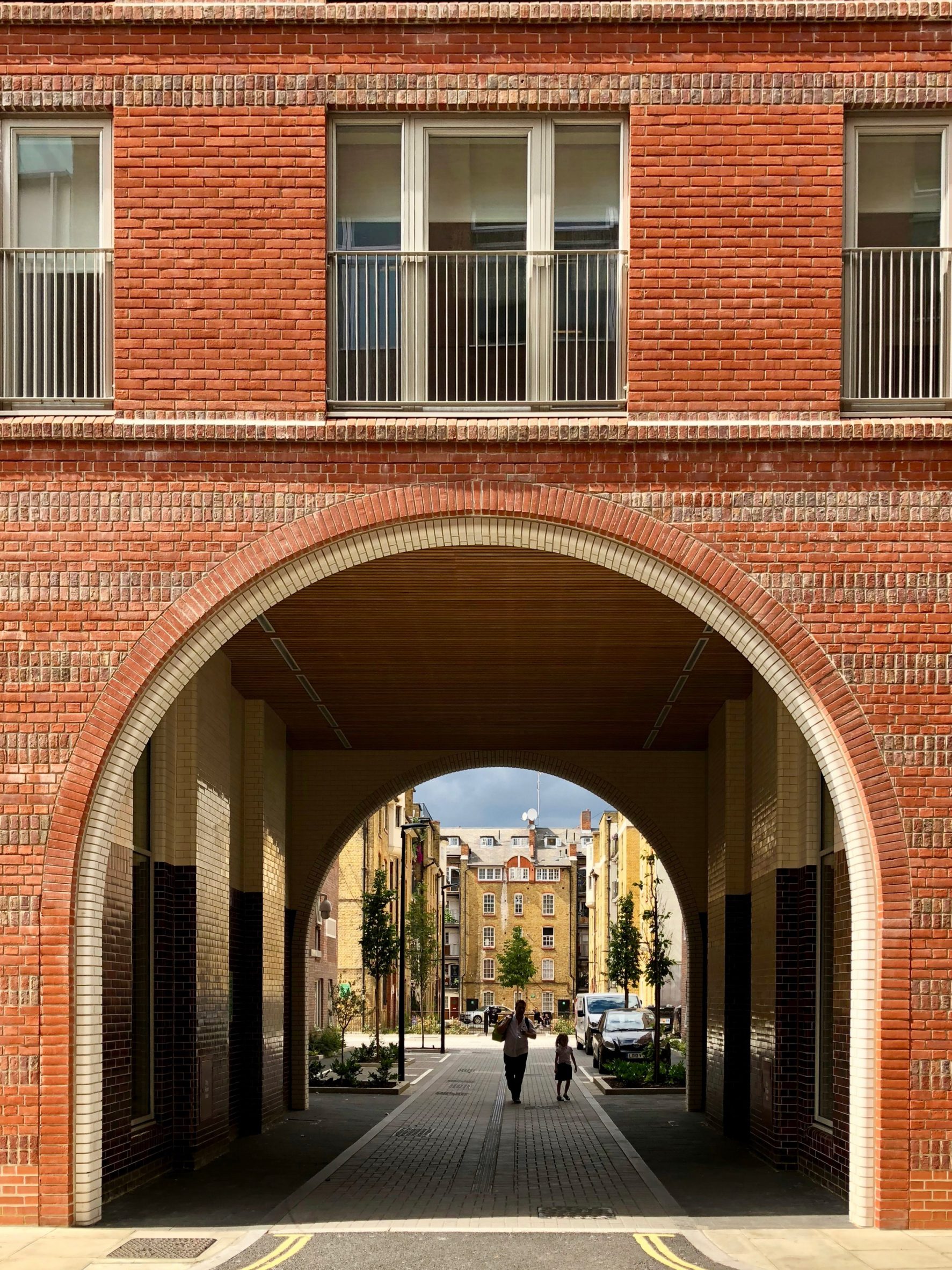 Arched brick entrances at the Bourne Estate in London