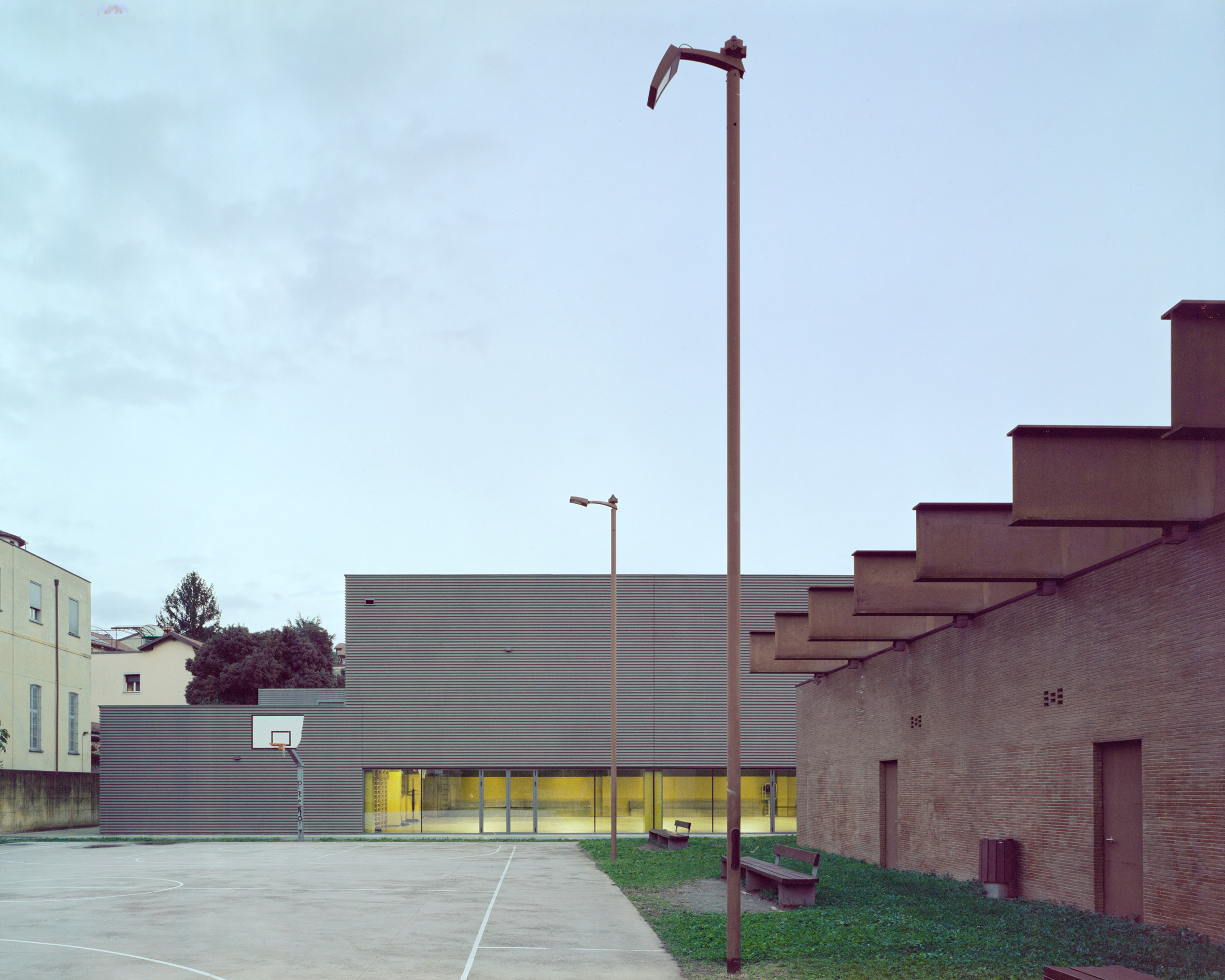 Concrete-clad gymnasium in Merate