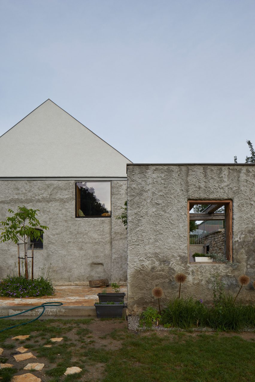 Exterior of New House with Old Mill by RDTH Architekti