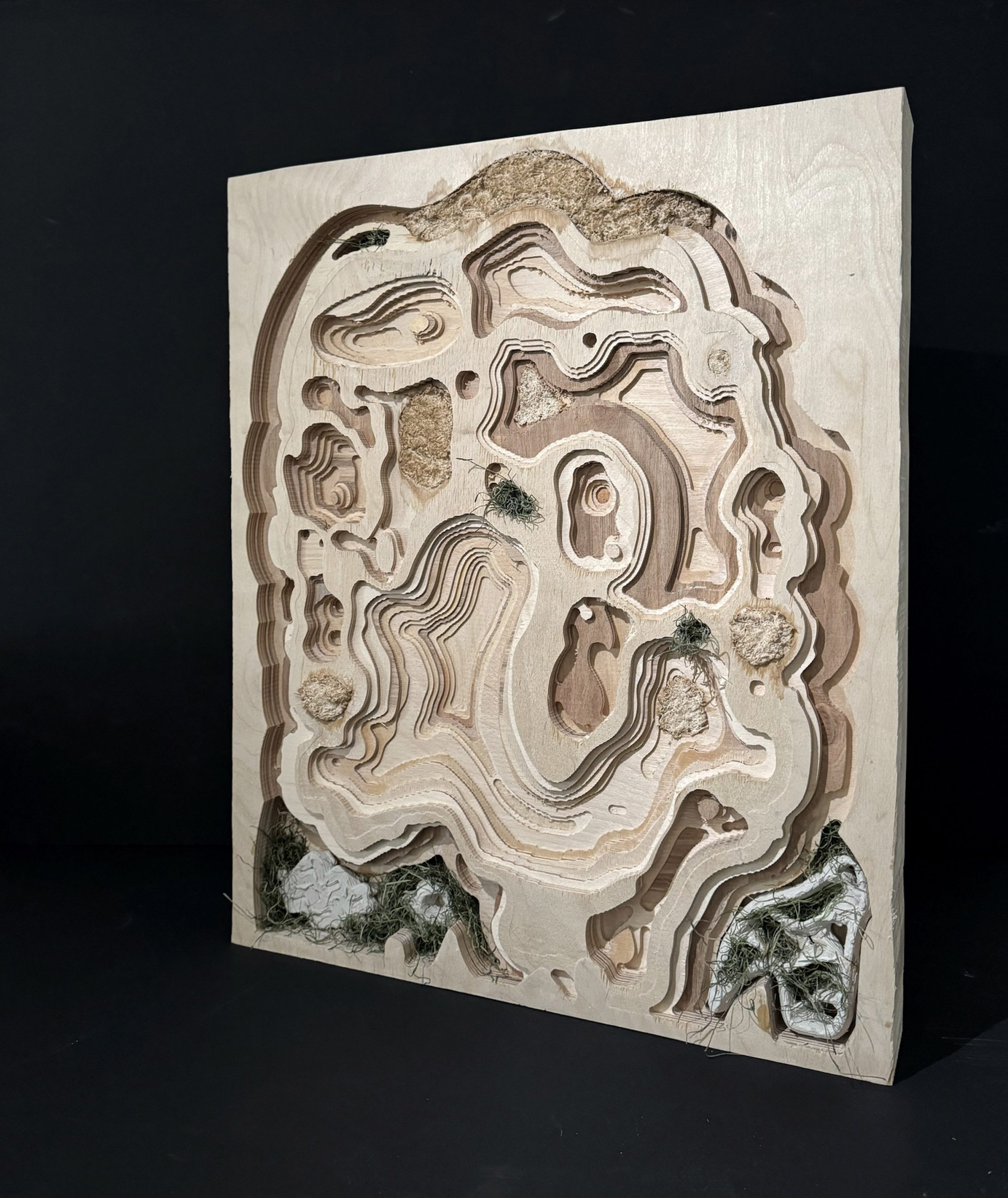 A panel made from wood and clay
