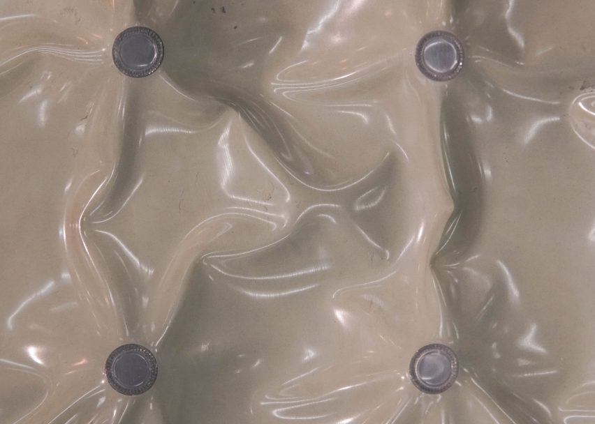 Close-up of buttons on clay-filled upholstery by Niveau Zéro Atelier for Relay Design Projects at Collectible 2024