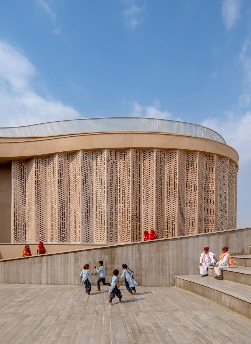 Triangulated screened facade of Nokha Village Community Centre by Sanjay Puri Architects in India
