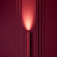 Wall light in red cinema room