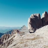 Senoner Tammerle Architekten places reflective mountain shelter in Italian Alps