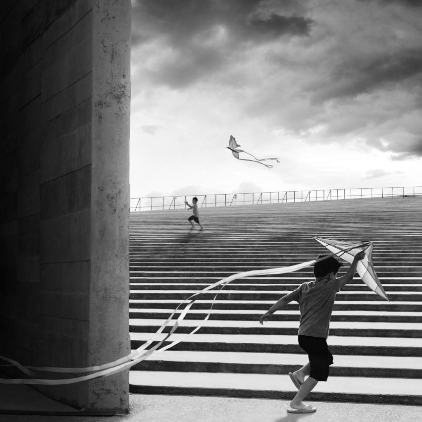 A striking photo of a boy flying a kite playing on the steps of the Teopanzolco Cultural Center in Mexico