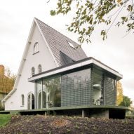Madam Architectuur perches green-tiled home extension on curved concrete terrace