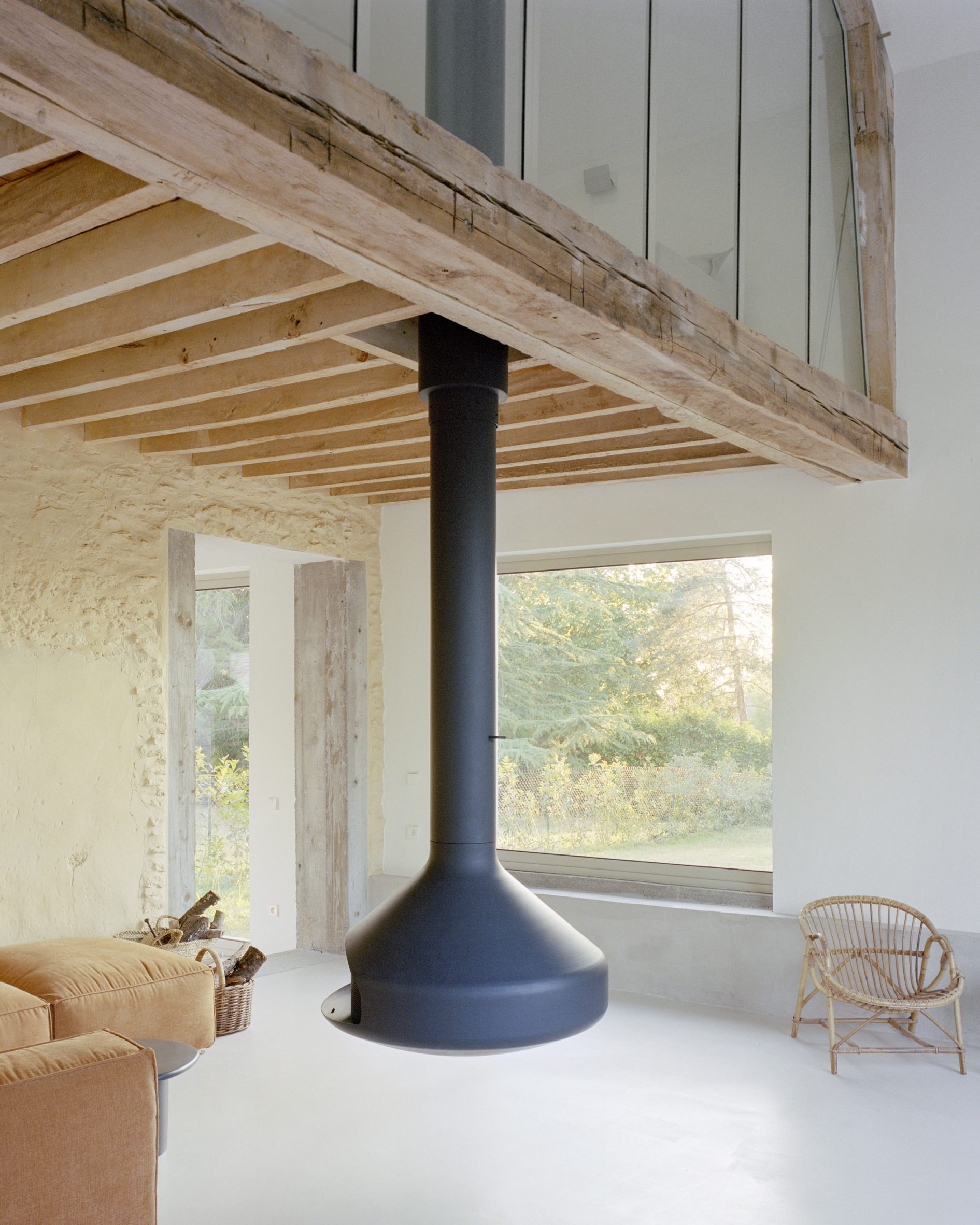 Suspended fireplace at Maison Hercourt in Normandy