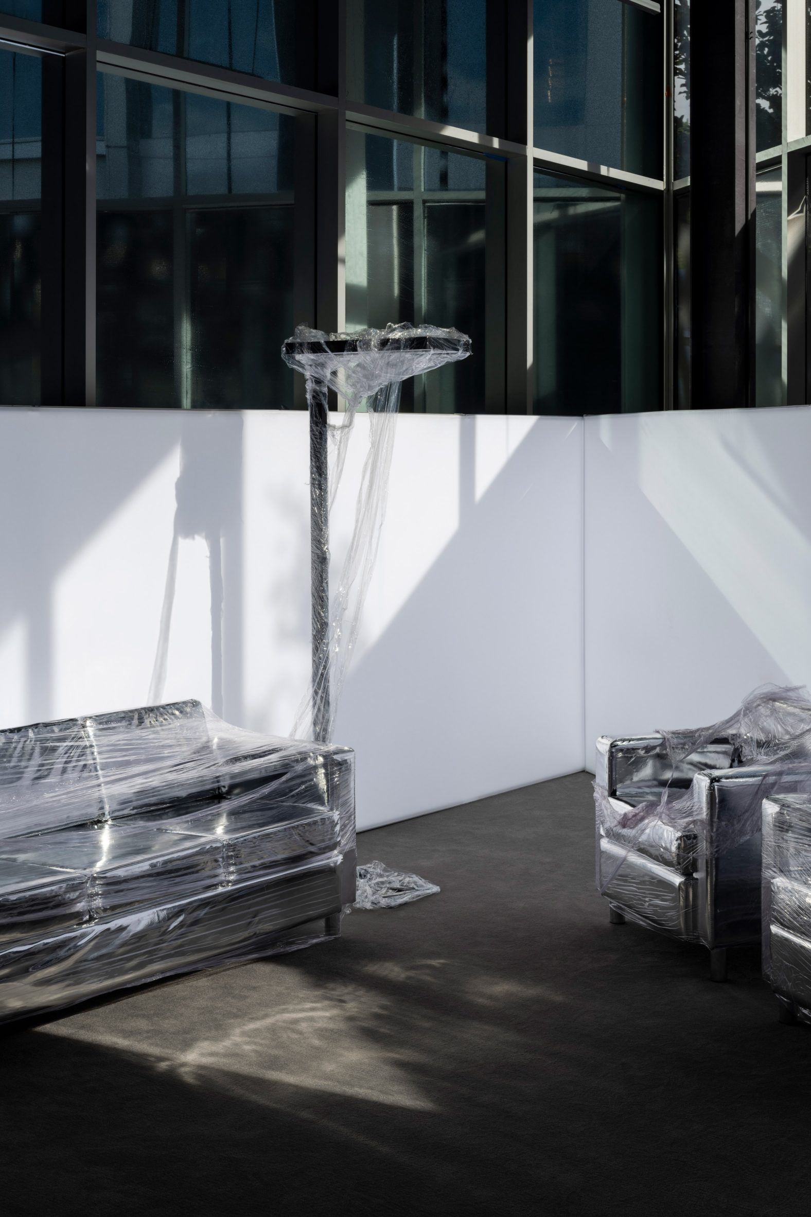 Plastic-wrapped silver furniture