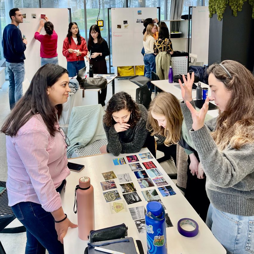 a photograph of students gathered around a table