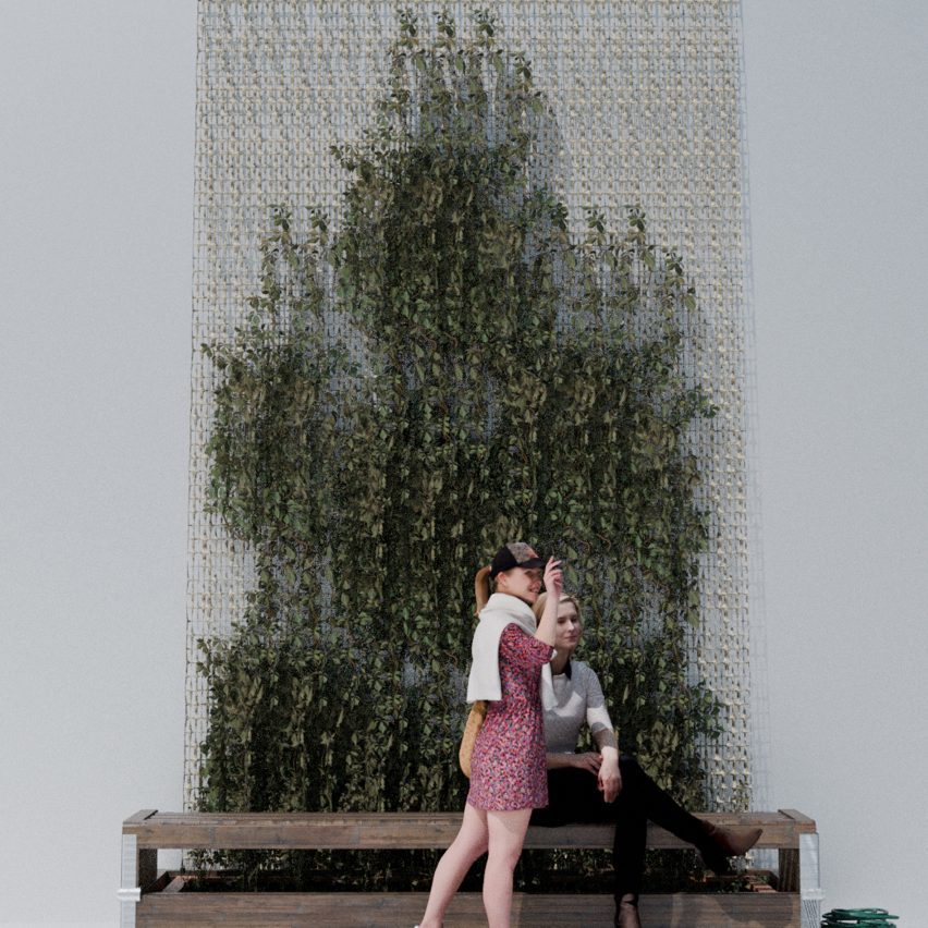 an image showing people sat on a bench with a green and beige backdrop