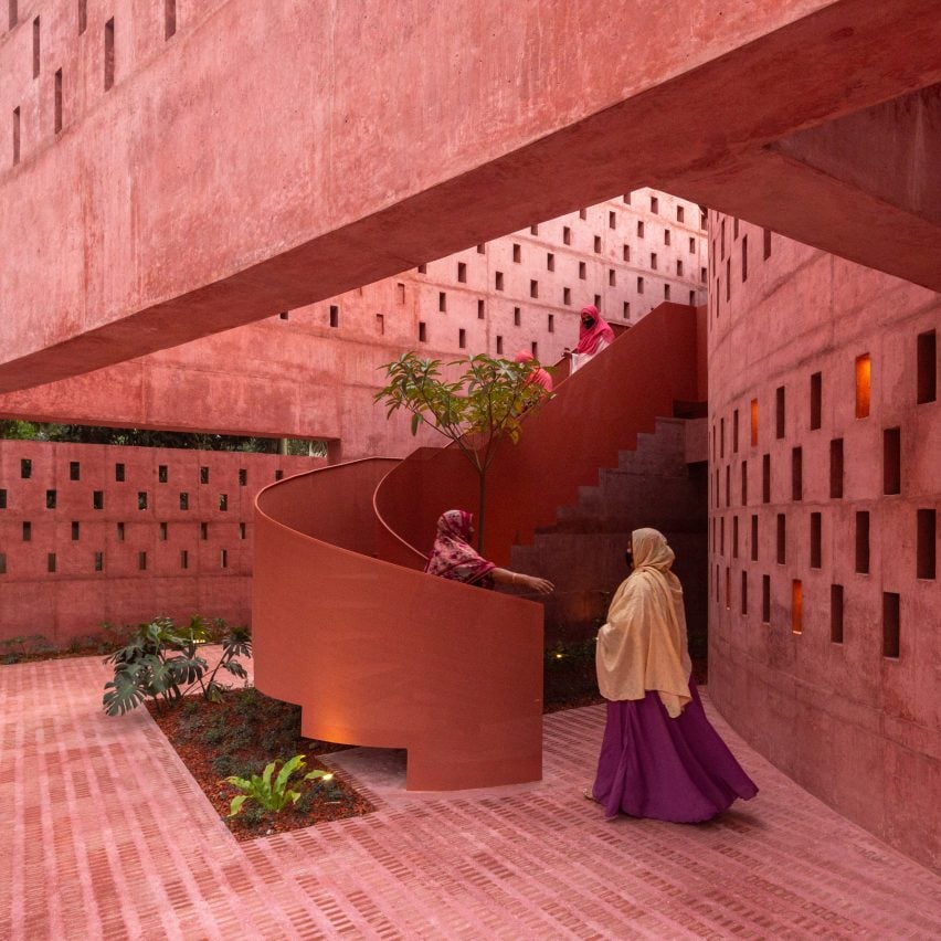 Studio Morphogenesis wraps waterside mosque in Bangladesh in perforated pink concrete