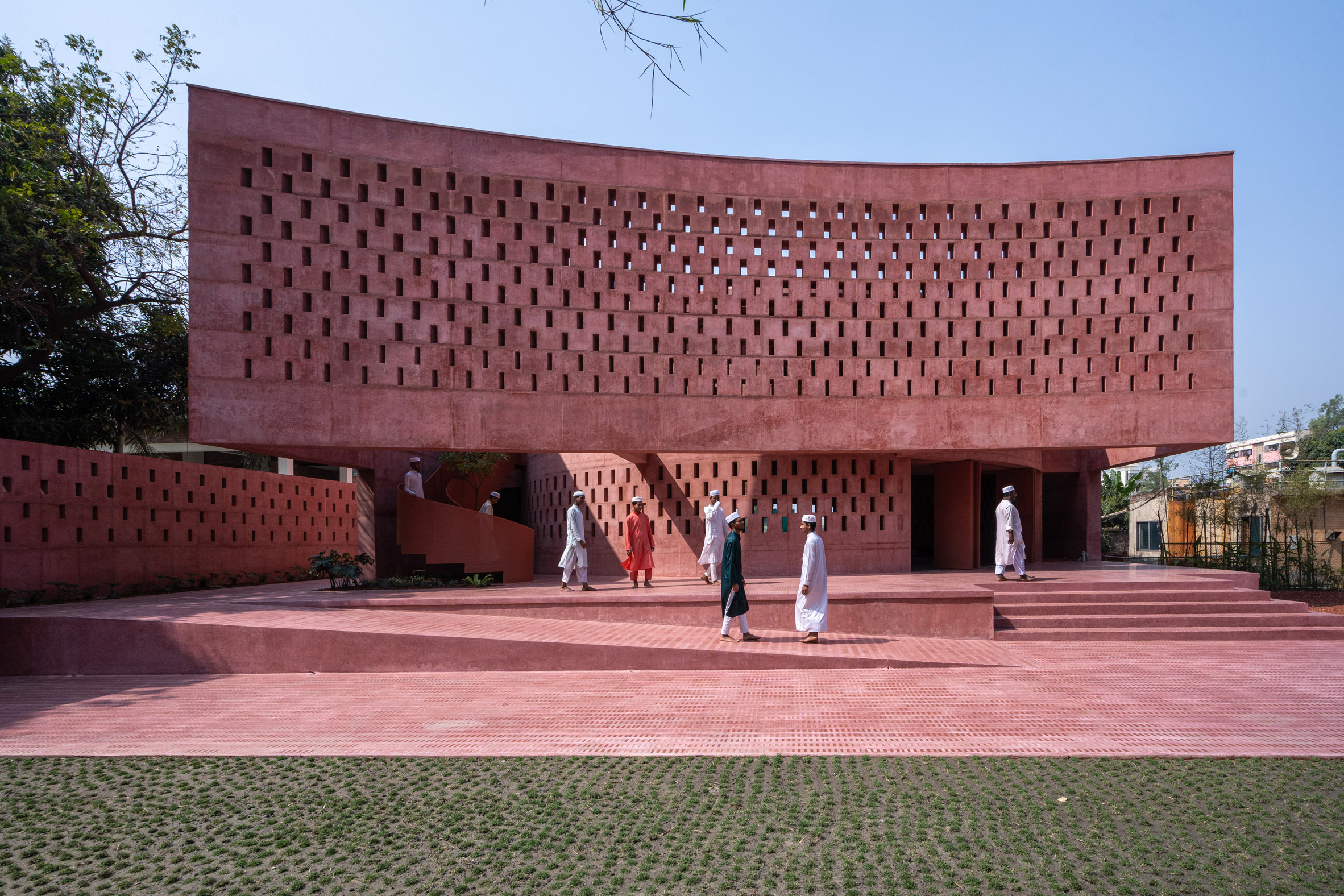 Monolithic pink concrete forms waterside mosque in Bangladesh - Vimarsana News