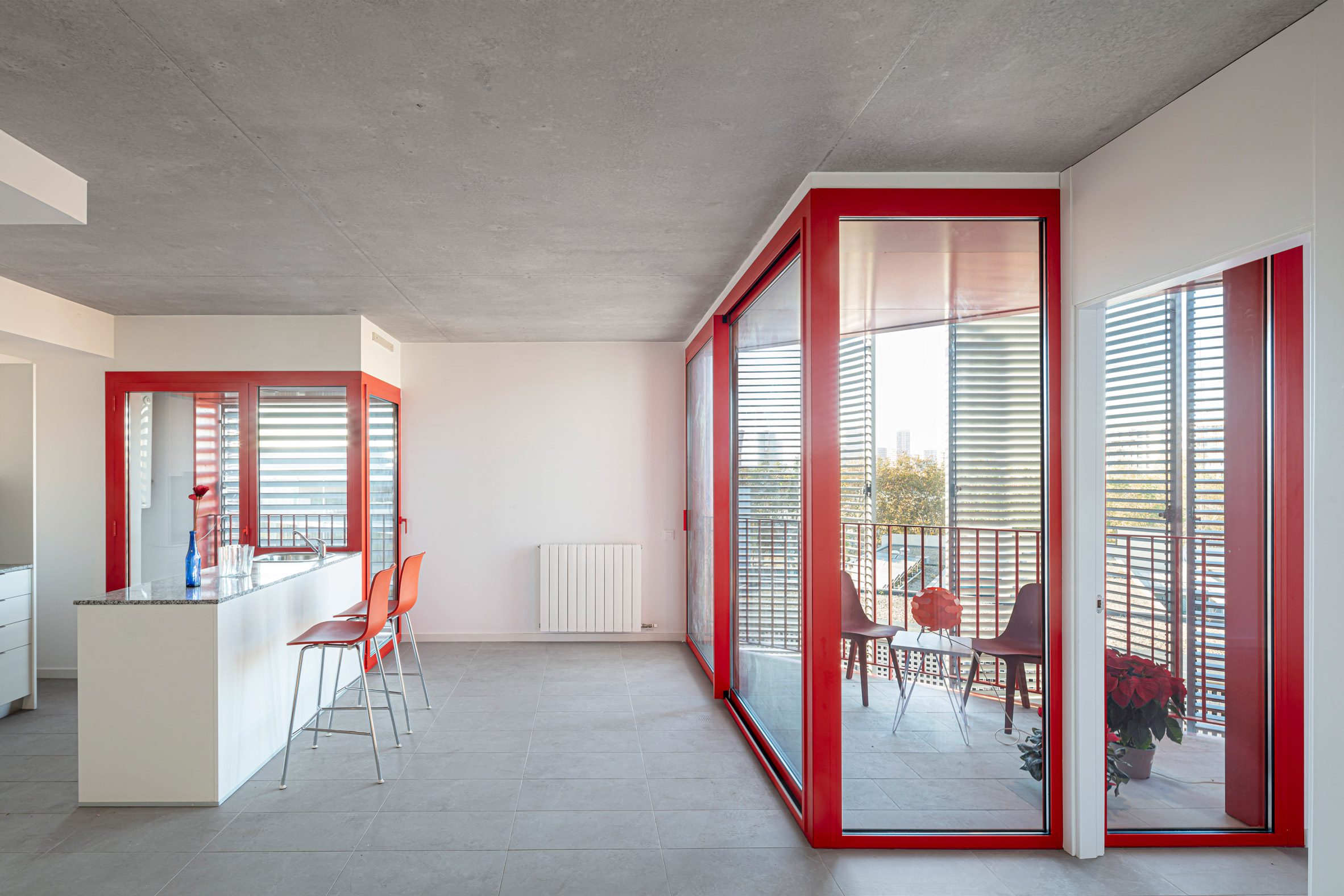 Red-lined apartment interior in Barcelona by MIAS and Coll-Leclerc Architects