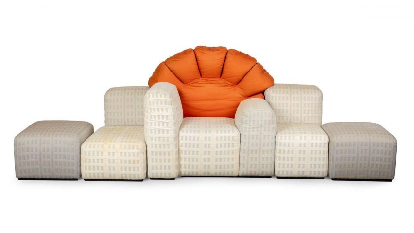 Photo of cream and orange sofa