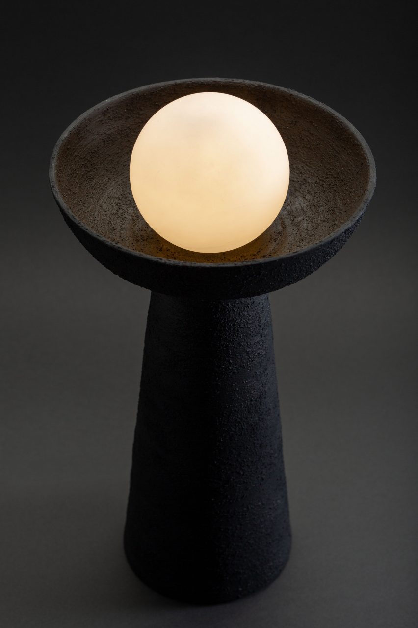 Spherical lamp on a ceramic stand