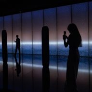 Hideki Yoshimoto lines reflective installation with illuminated fibreglass "soldiers"