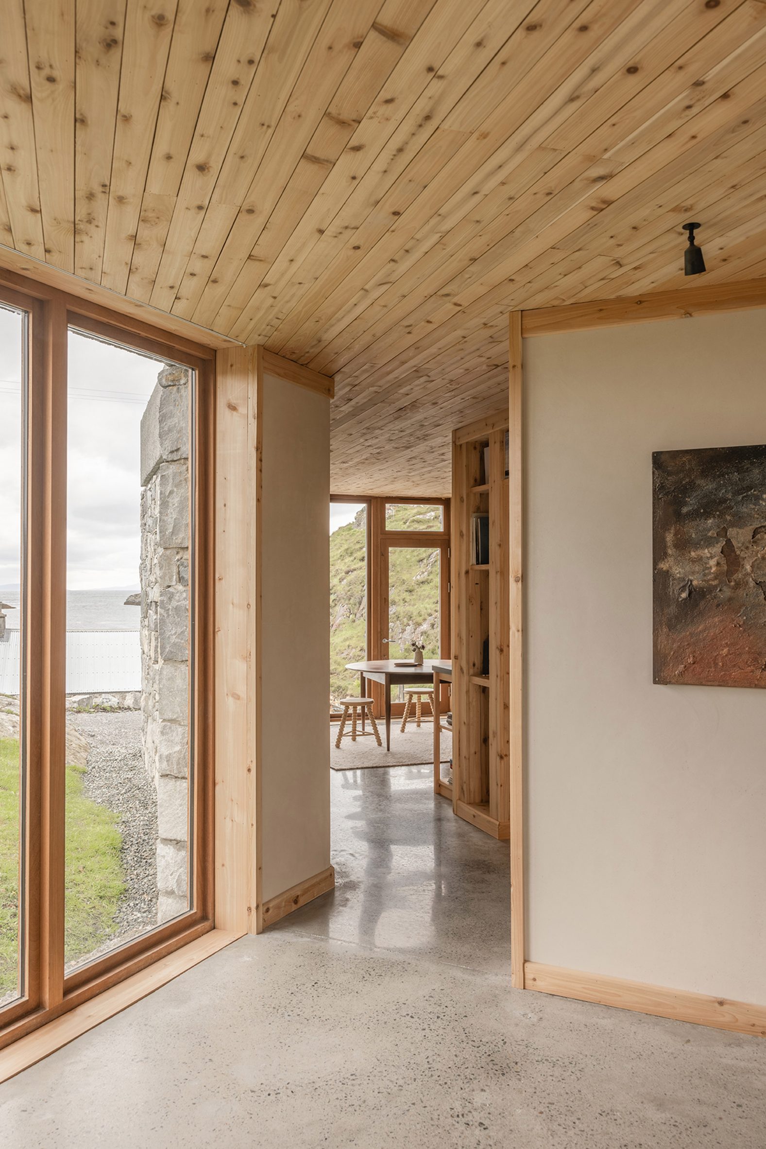 Timber-lined interior of a stone home in Scotland