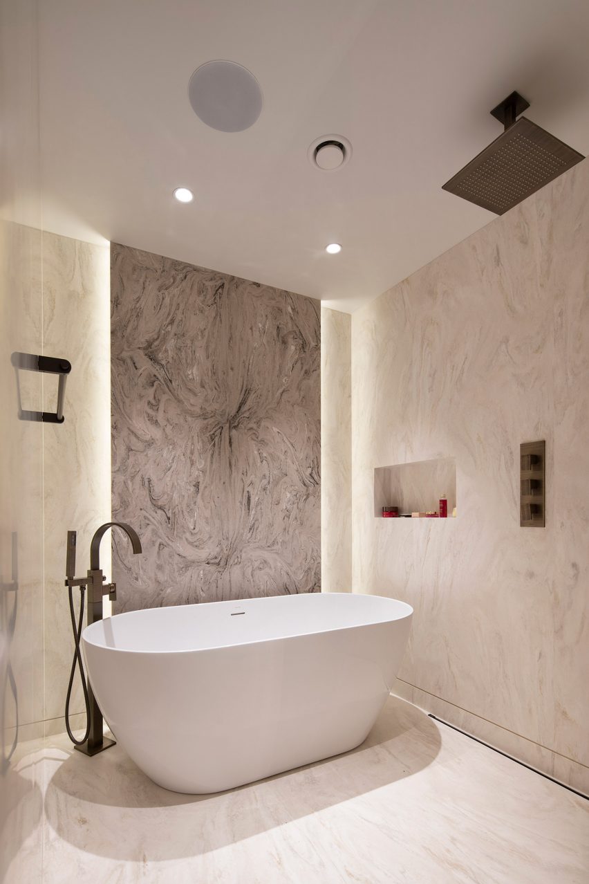 Bathtub and wall feature within Masterpiece Bathroom in Sofia