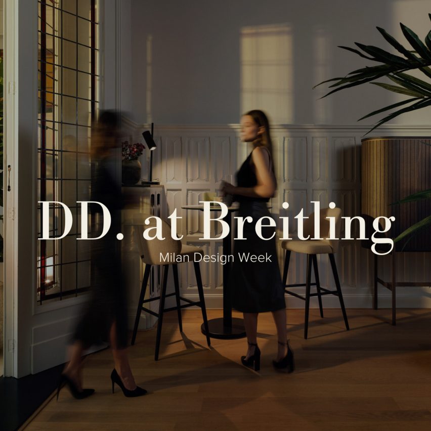 Photo of people in a room with DD at Breitling logo