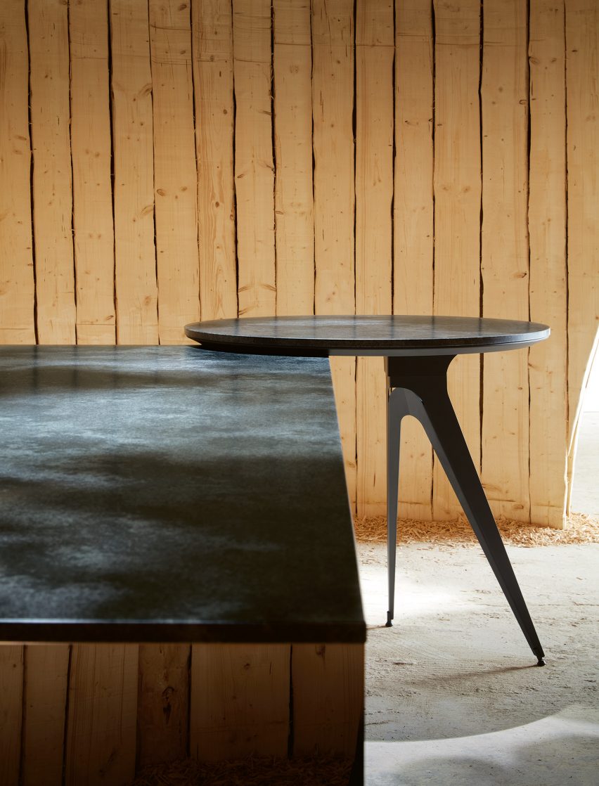 Kitchen island and adjoining table within The Fireplace