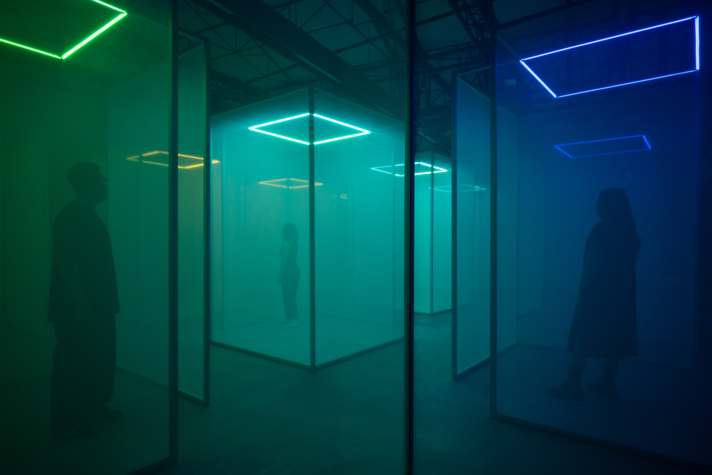 People standing in Making sense of color installation by Chromasonic for Google at Milan design week 2024