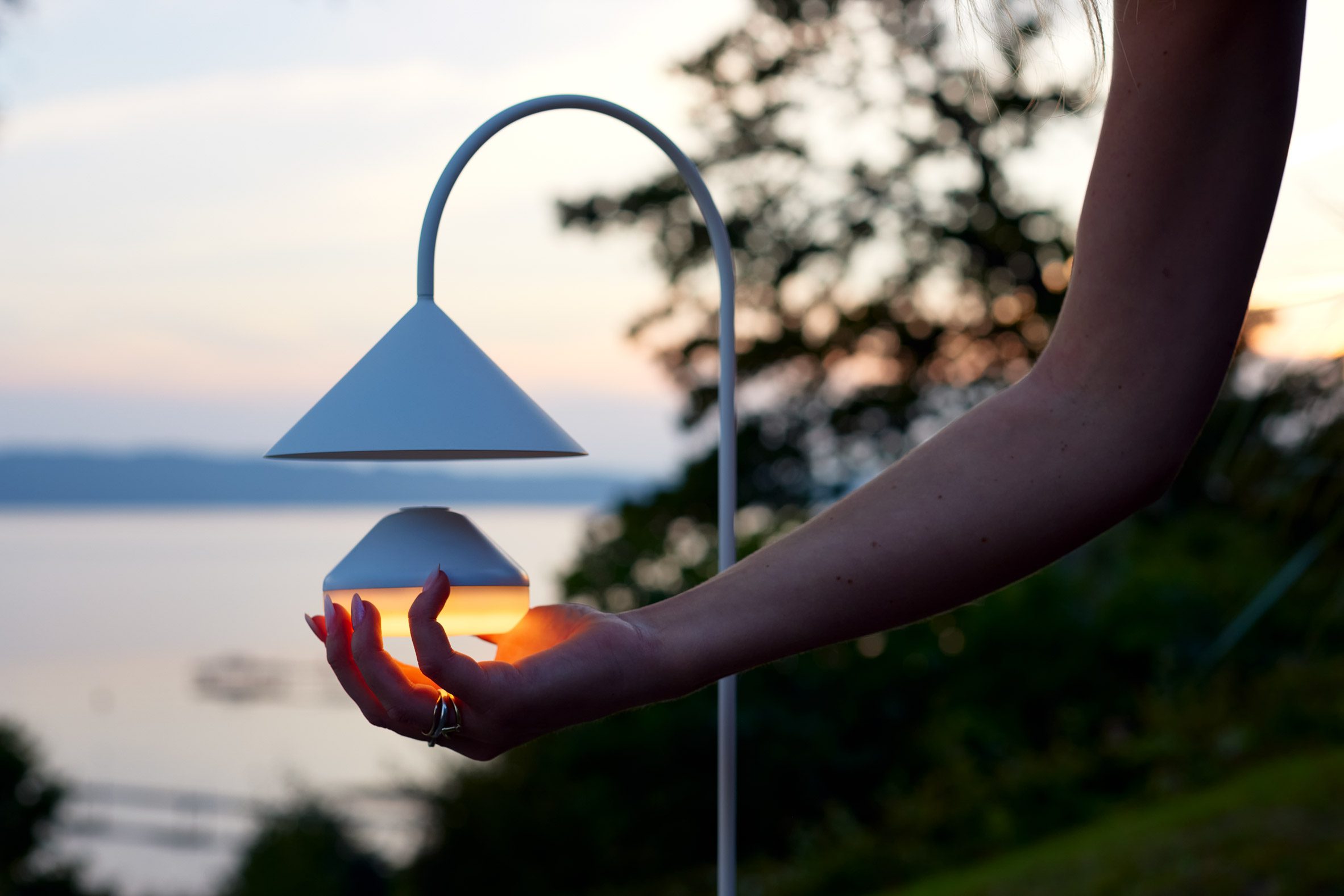 Grasp portable lamp by Thomas Albertsen for Frandsen