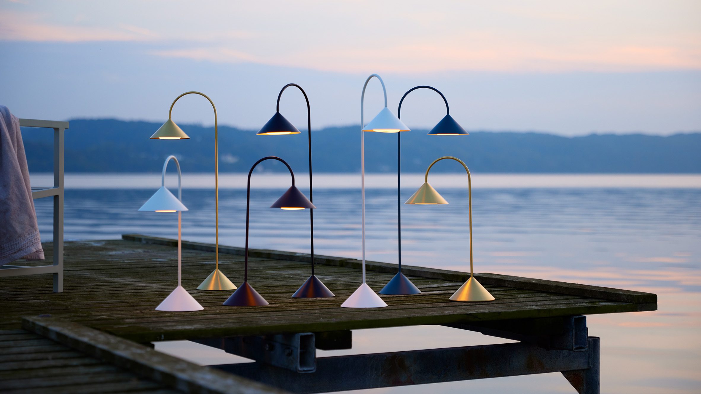 Grasp portable lamp by Thomas Albertsen for Frandsen