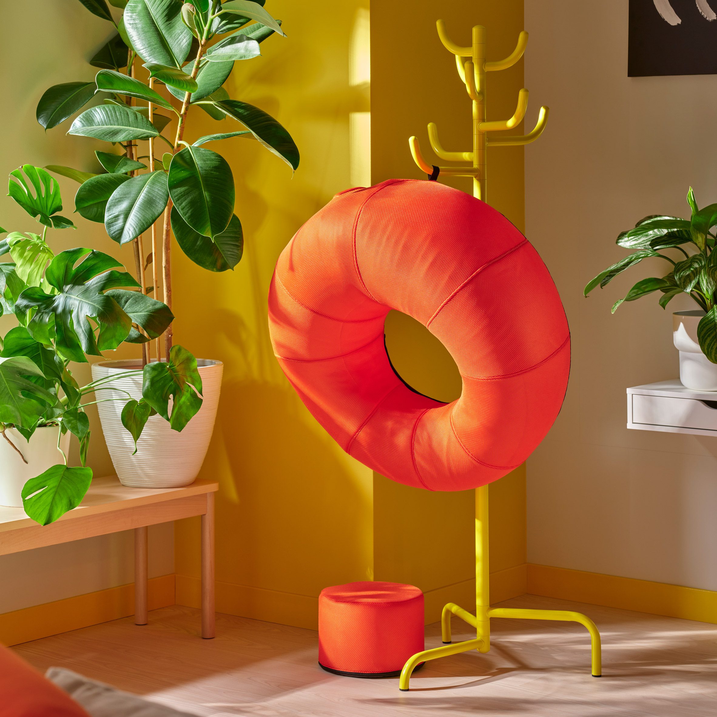 IKEA inflatable chair hanging from a coat hook