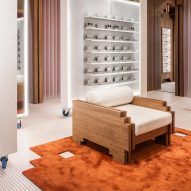 Pixelated furniture appears throughout Lunet eyewear store in Bucharest