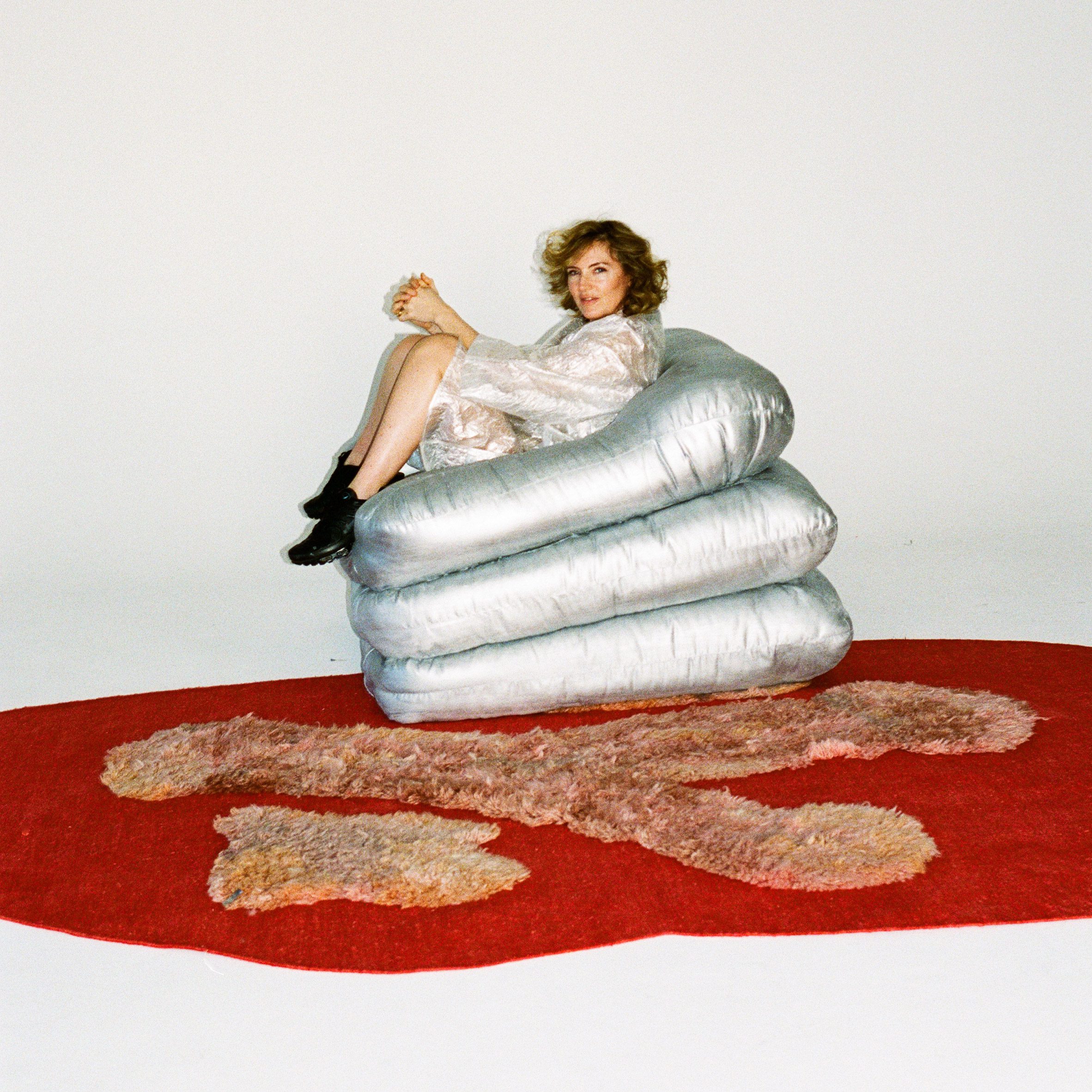 Faye Toogood in silver inflatable chair