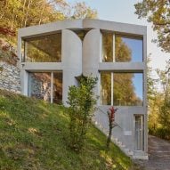 Celoria Architects designs concrete home in Medrisio as "massive primitive object"
