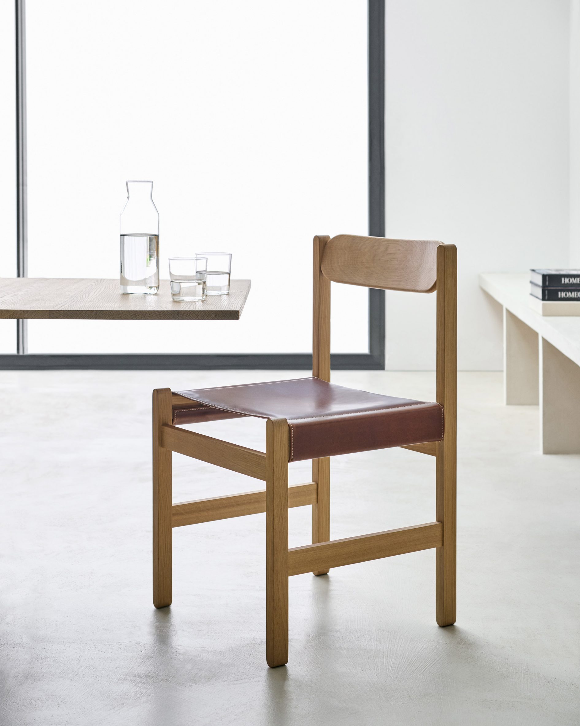 The Highgate Chair features a leather seat that can be re-tensioned as required