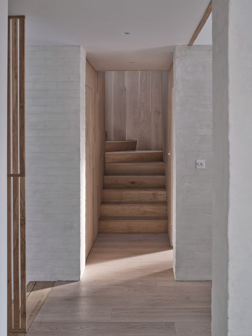 Stairs leading up to first floor at residence by Smith Young Architects