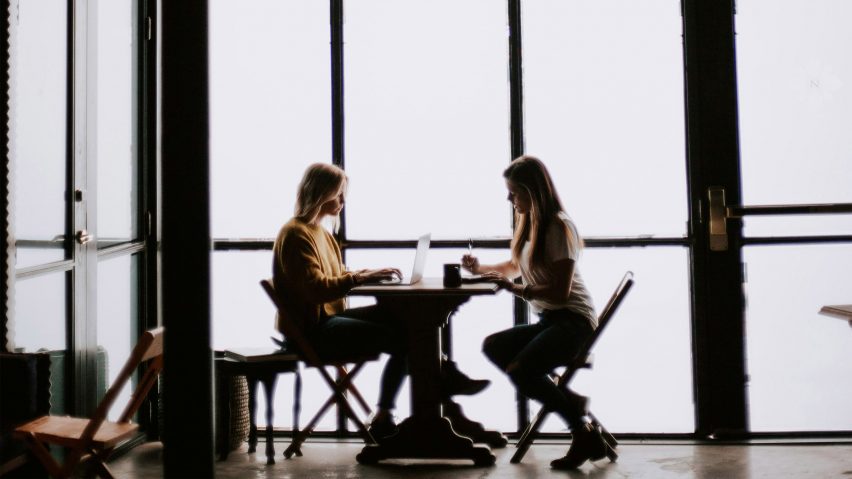 Two women working in an office