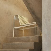 Photo of white chair on stairs